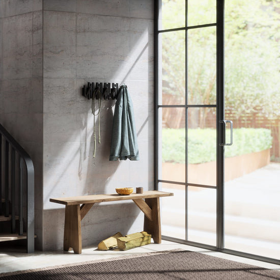 Umbra coat rack — wall-mounted design with hooks for storage