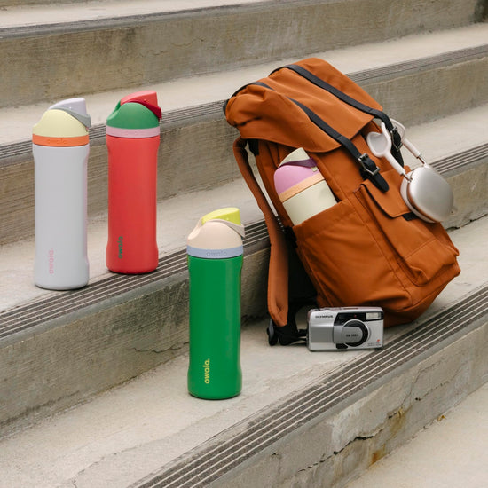 Owala FreeSip insulated stainless steel water bottle with straw, 24 oz capacity.