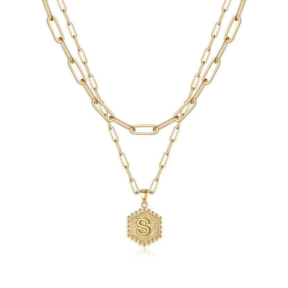 Necklace — Dainty initial design in 14K gold-plated finish by M MOOHAM