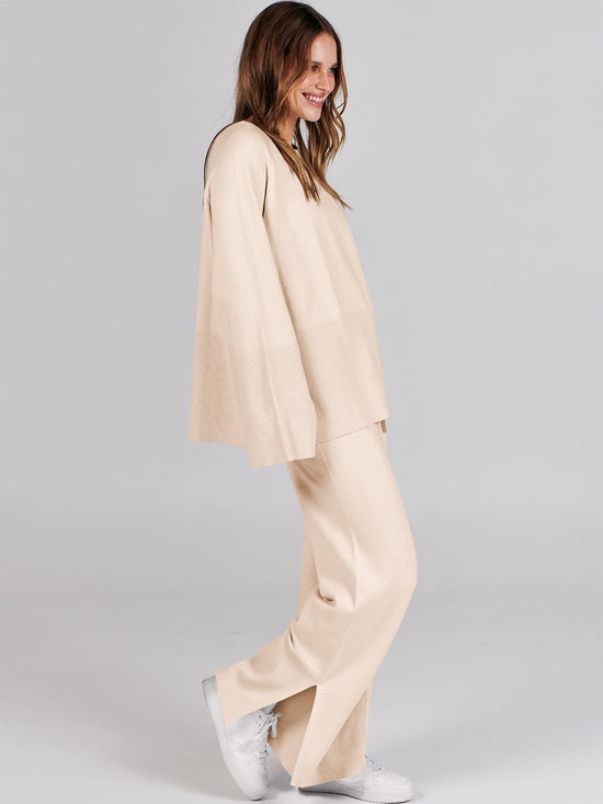 Coordinated outfit — Oversized knit sweater and wide leg pant set by ANRABESS