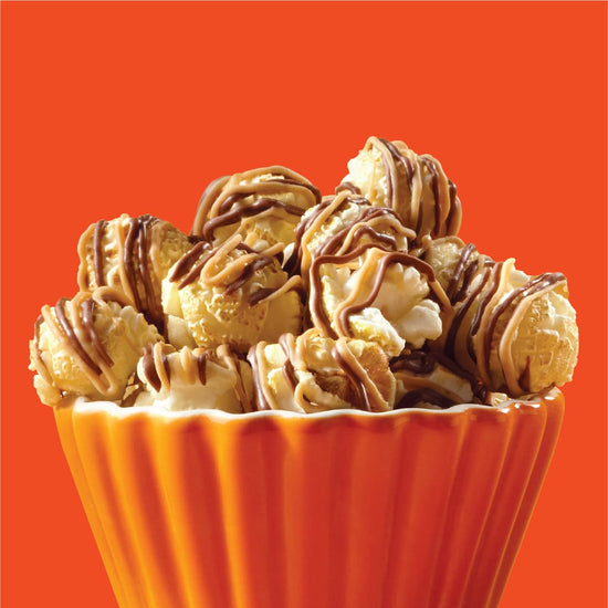 Reese's popcorn — popcorn coated in chocolatey drizzle and peanut butter crème
