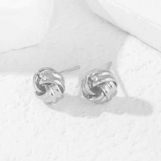 Earring — 14K gold plated knot design in gold and silver tones