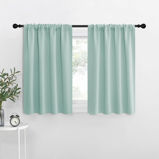 NICETOWN curtains — 2 panels with blackout feature and rod pocket design