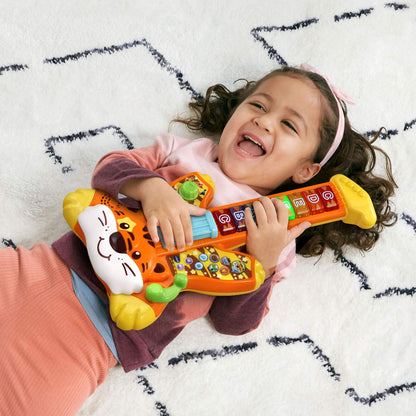 VTech musical instrument toy — Tiger Rock guitar with zoo jamz features