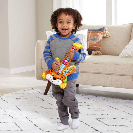 VTech musical instrument toy — Tiger Rock guitar with zoo jamz features