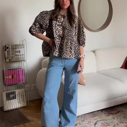 Shirt — Tie front leopard print peplum babydoll top with puff sleeves and coquette style