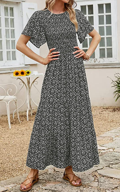 PRETTYGARDEN dress — Boho floral maxi with flutter sleeves and smocked tiered design