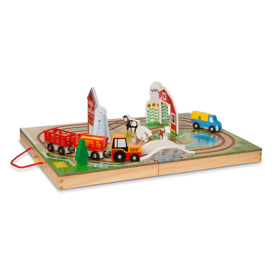 Melissa & Doug wooden take-along tabletop farm with vehicles and play pieces for toddlers 1+