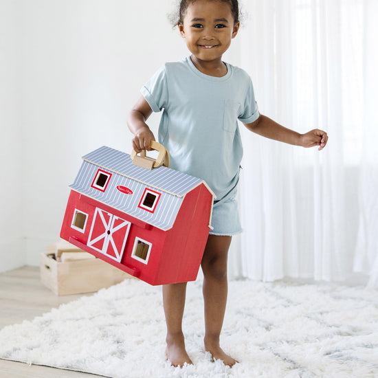 Melissa & Doug toy figure playset — foldable design for easy storage and transport