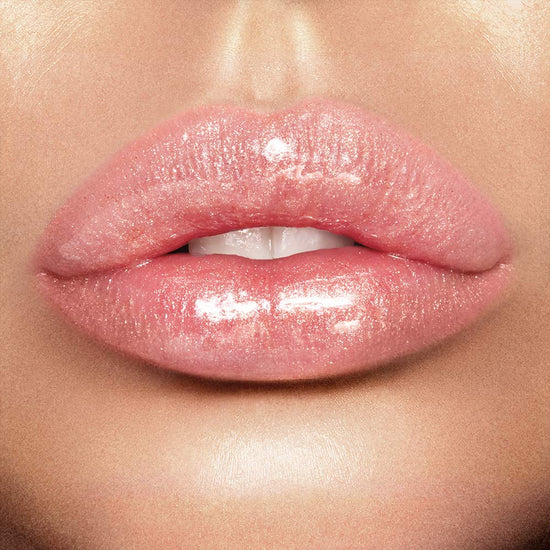 Charlotte Tilbury Lip Lustre — Hydrating lip gloss with lotus extract