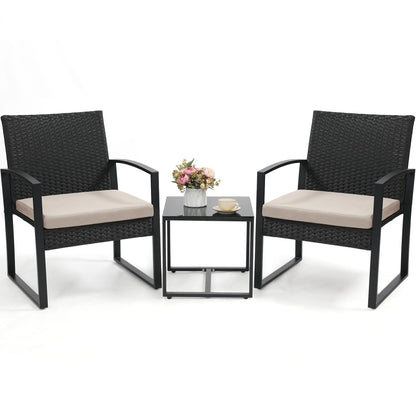Murago 3 piece wicker patio bistro set with coffee table in black frame and cushion