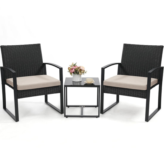 Murago 3 piece wicker patio bistro set with coffee table in black frame and cushion