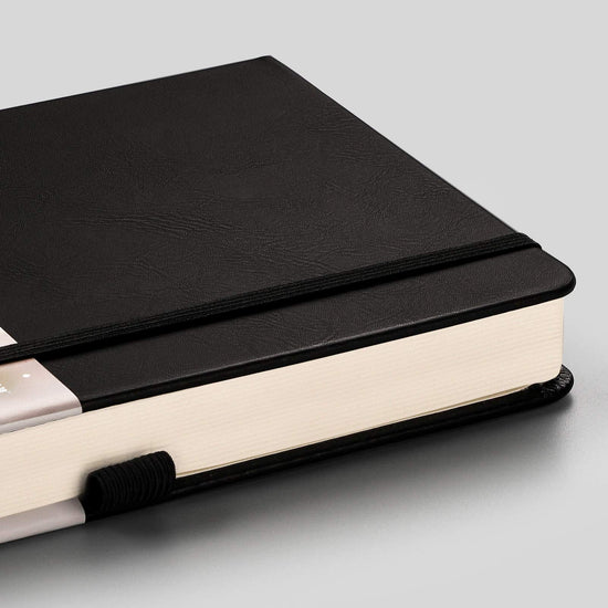 BLANK_BOOK — EMSHOI faux leather hardcover with numbered pages and college ruled grid