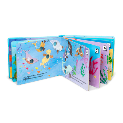 Melissa & Doug Poke-a-Dot children's board book with interactive buttons to pop