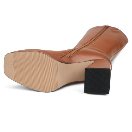 COLETER knee high gogo boots with chunky heel and zipper closure.