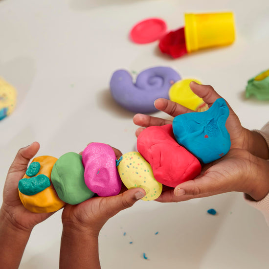 Play-Doh sculpting material — includes confetti and metallic shine colors