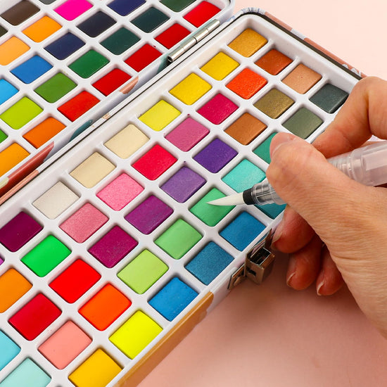 Grabie watercolor paint set - 100 colors including metallic and fluorescent hues with accessories
