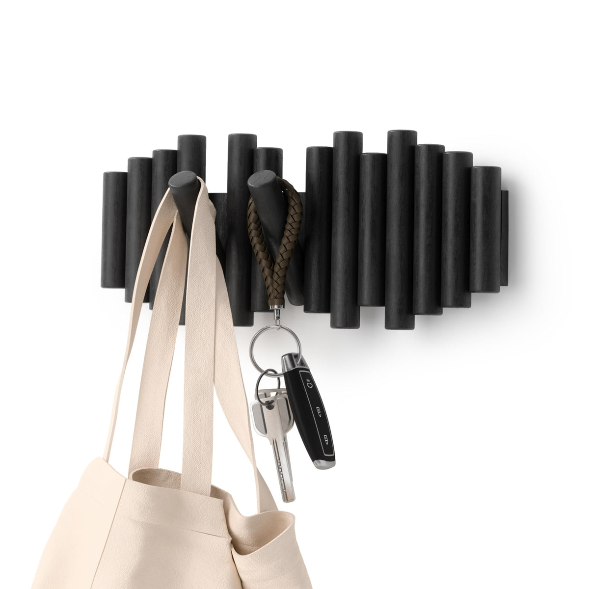Umbra coat rack — wall-mounted design with hooks for storage