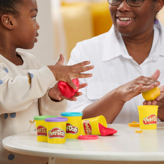 Play-Doh sculpting material — includes confetti and metallic shine colors