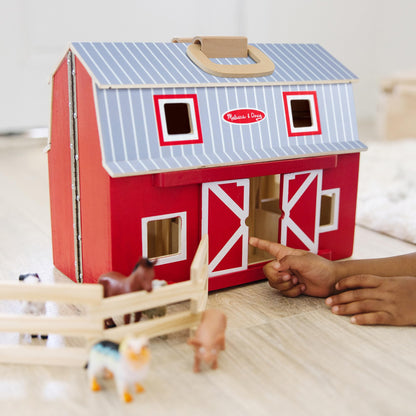 Melissa & Doug toy figure playset — foldable design for easy storage and transport