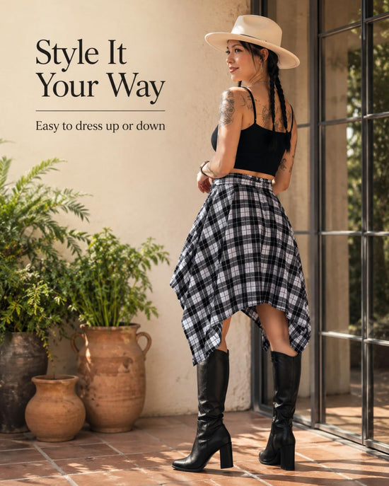 Skirt — High waisted plaid mini with asymmetrical hem and knot front design.