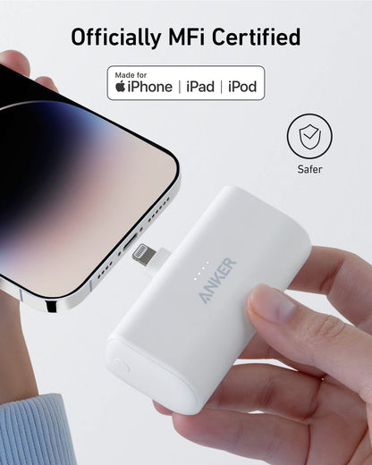 Anker power bank with built-in Lightning connector, 5000mAh capacity, compatible with iPhone 14/13/12 series, black color.