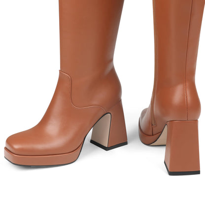 COLETER knee high gogo boots with chunky heel and zipper closure.