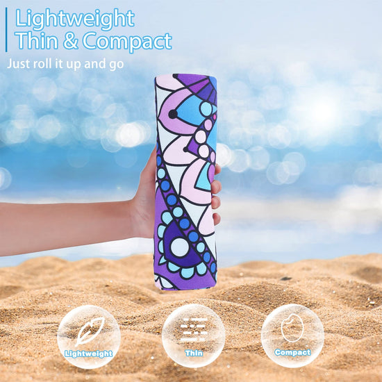 Microfiber towel — sand free and quick drying for travel and outdoor activities.