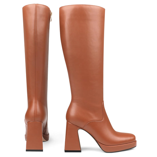 COLETER knee high gogo boots with chunky heel and zipper closure.