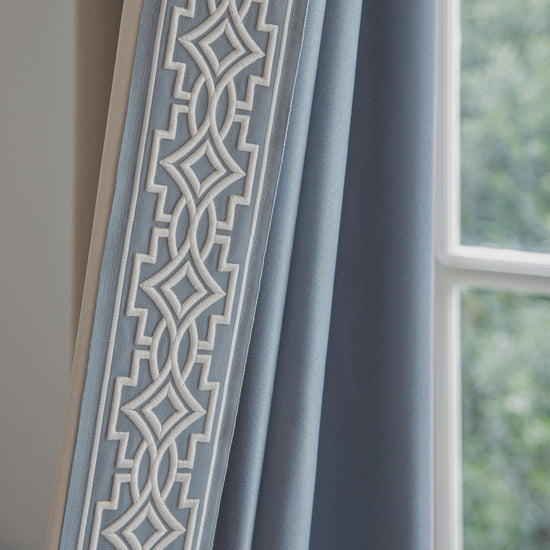 VisionaryHomeDesign curtain panels with embroidered design and tape trim