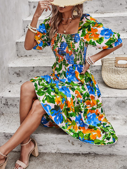 PRETTYGARDEN dress with puff sleeves and floral design.