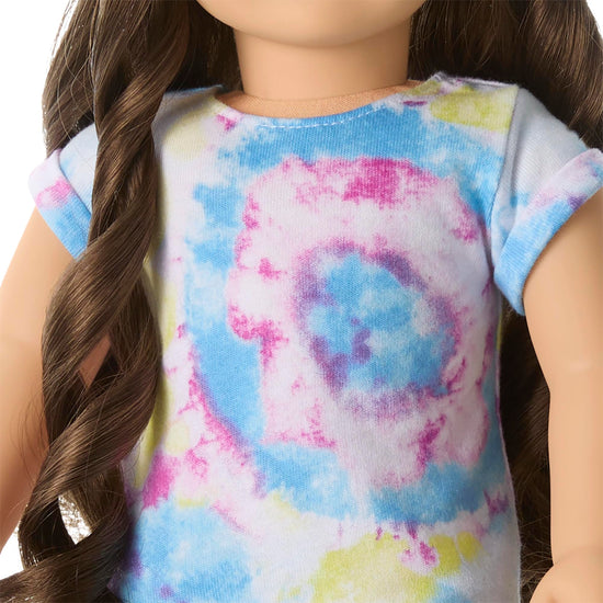 American Girl doll with blue eyes and wavy brown hair for ages 6+
