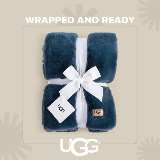 UGG Euphoria plush faux fur reversible blanket for luxury hotel style couch