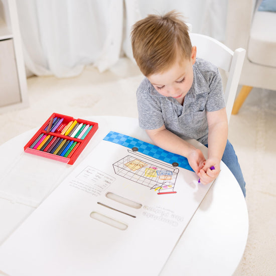 Melissa & Doug Poke-a-Dot children's board book with interactive buttons to pop