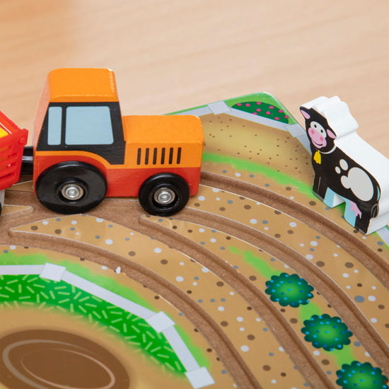 Melissa & Doug wooden take-along tabletop farm with vehicles and play pieces for toddlers 1+