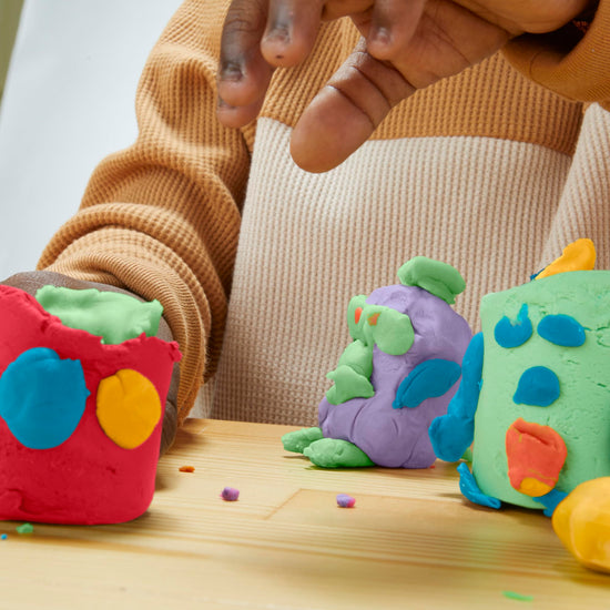 Play-Doh sculpting material — includes confetti and metallic shine colors