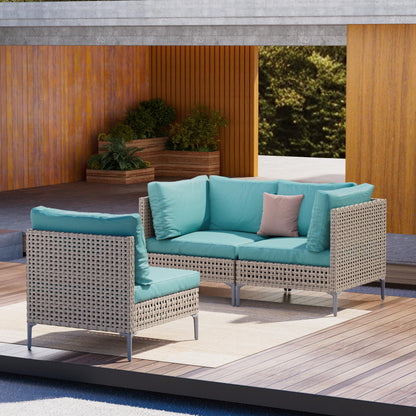 Grand patio wicker sectional sofa with beige cushions and coffee table