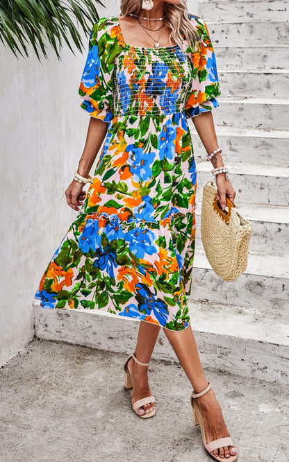 PRETTYGARDEN dress with puff sleeves and floral design.