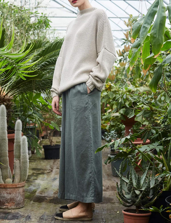 Sweater — Women's oversized batwing sleeve mock neck pullover by Ugerlov