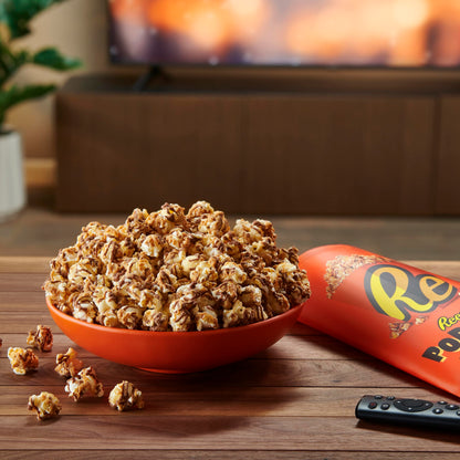 Reese's popcorn — popcorn coated in chocolatey drizzle and peanut butter crème
