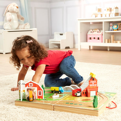 Melissa & Doug wooden take-along tabletop farm with vehicles and play pieces for toddlers 1+