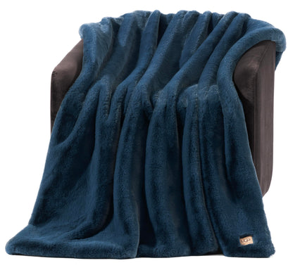 UGG Euphoria plush faux fur reversible blanket for luxury hotel style couch