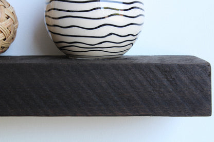 Urban Legacy floating shelves with reclaimed barnwood planks and shelf bracket set includedUrban Legacy floating shelves — reclaimed barnwood planks with bracket set included