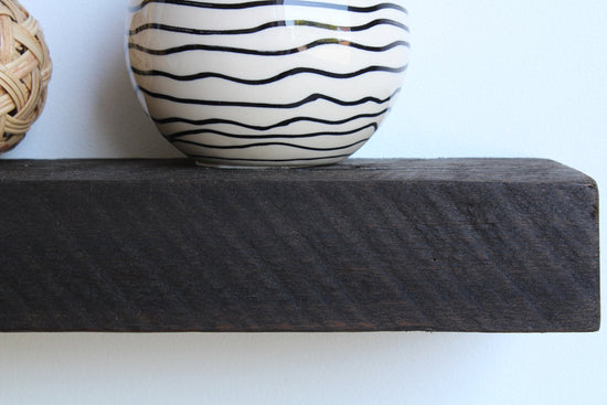 Urban Legacy floating shelves with reclaimed barnwood planks and shelf bracket set includedUrban Legacy floating shelves — reclaimed barnwood planks with bracket set included