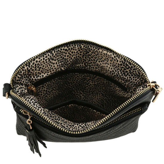 FashionPuzzle medium crossbody bag with tassel accent