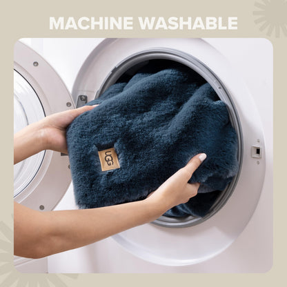 UGG Euphoria plush faux fur reversible blanket for luxury hotel style couch