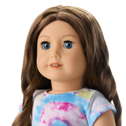 American Girl doll with blue eyes and wavy brown hair for ages 6+