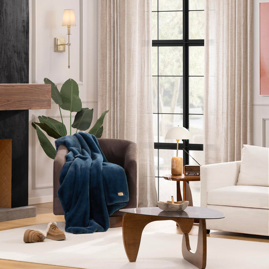 UGG Euphoria plush faux fur reversible blanket for luxury hotel style couch