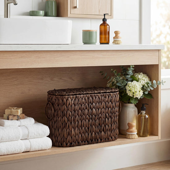 StorageWorks toilet paper holder — stores up to 6 rolls.