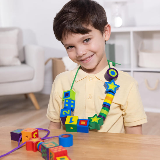 Melissa & Doug lacing beads - 27 wooden beads with 2 laces for fun activity